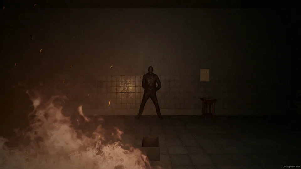 A charred figure stands lit by the flames in a tiled service tunnel