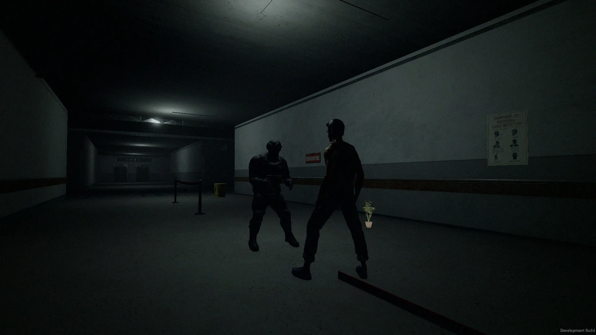 A charred figure closes on an armed survivor in a dark hospital corridor beneath a quarantine sign